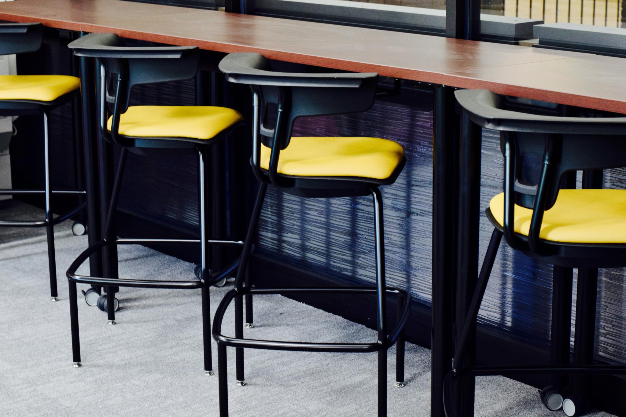 photo of stools in front of table