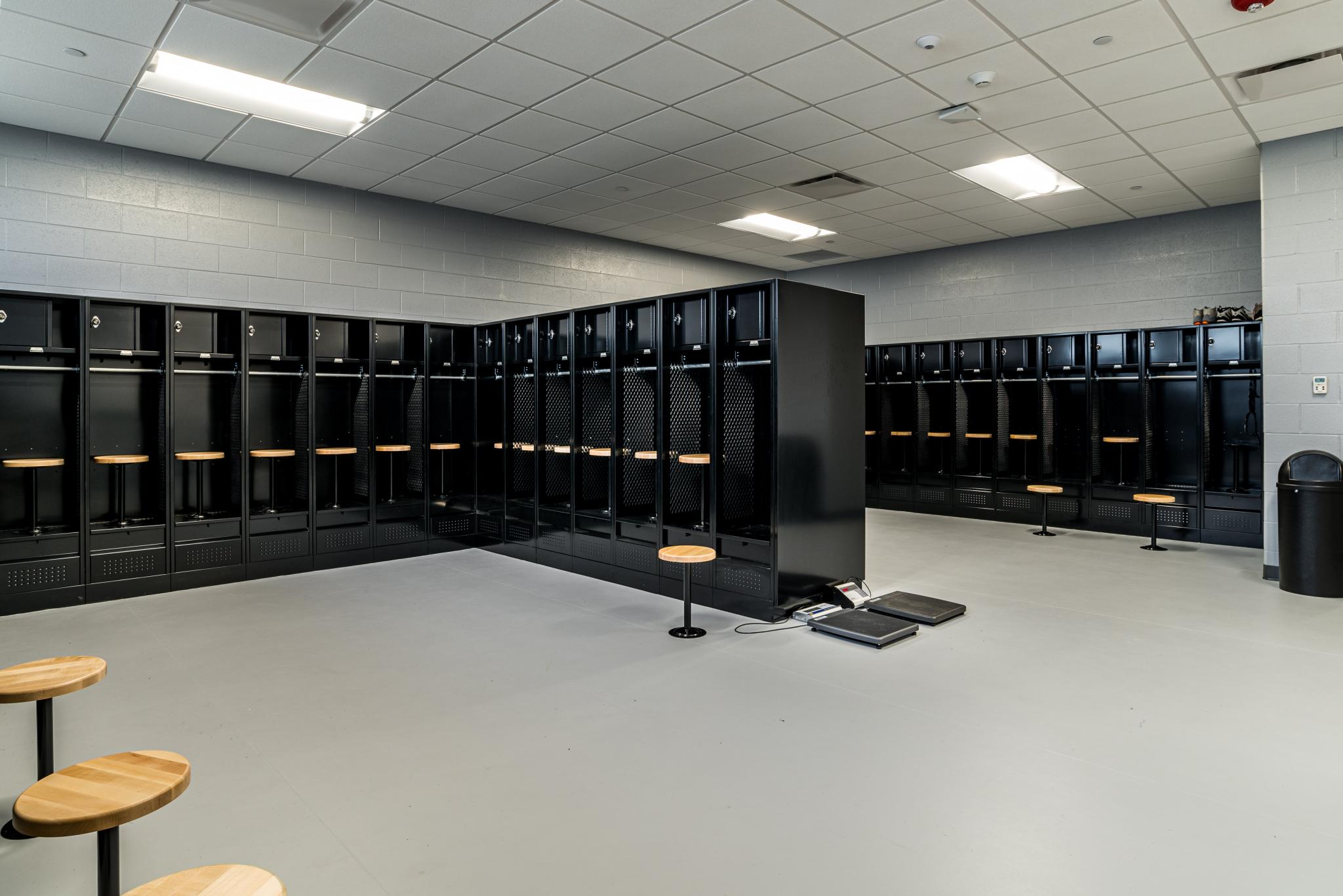 photo of a locker room with black painted lockers