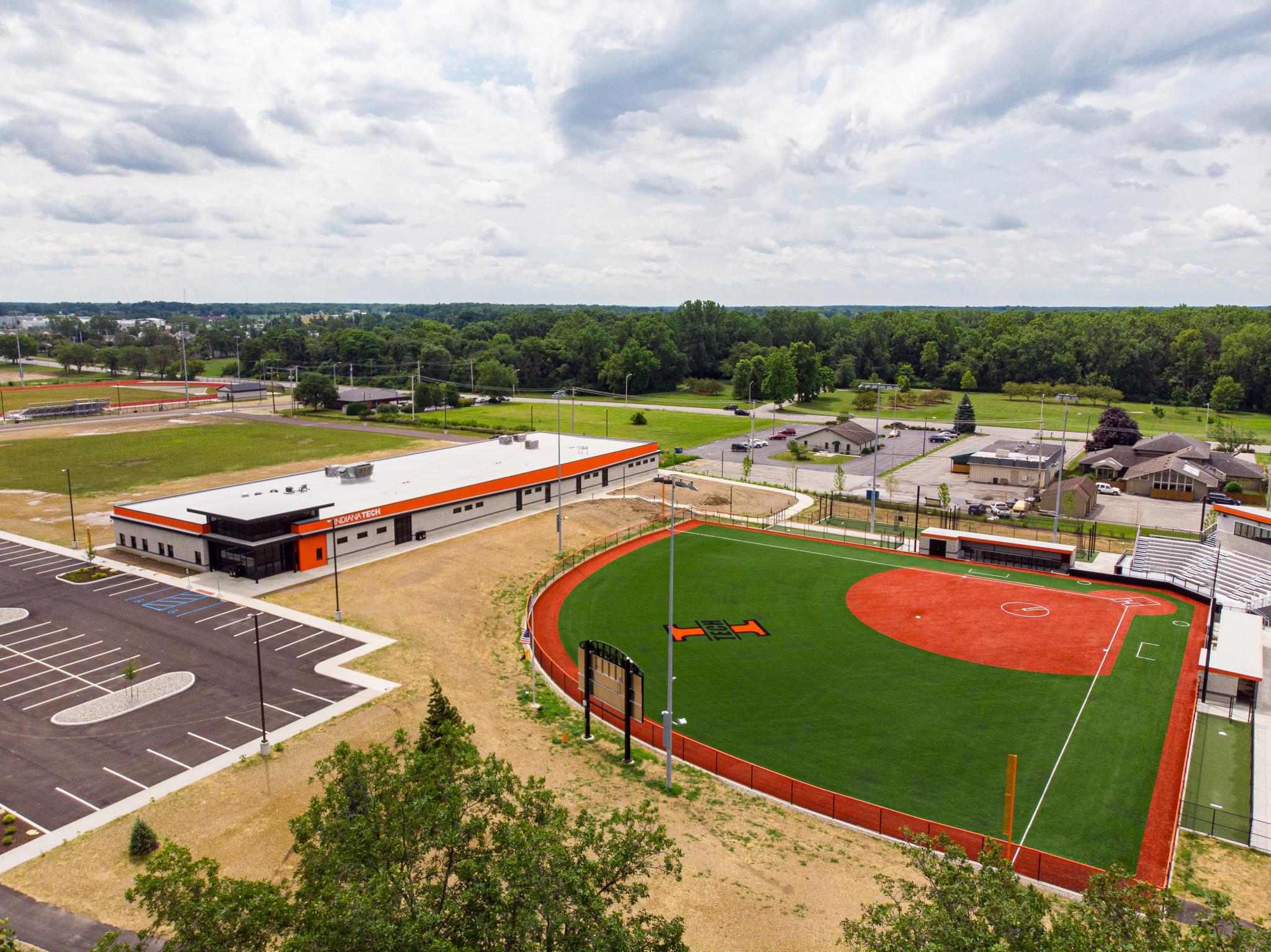 drone image of a softball field and building