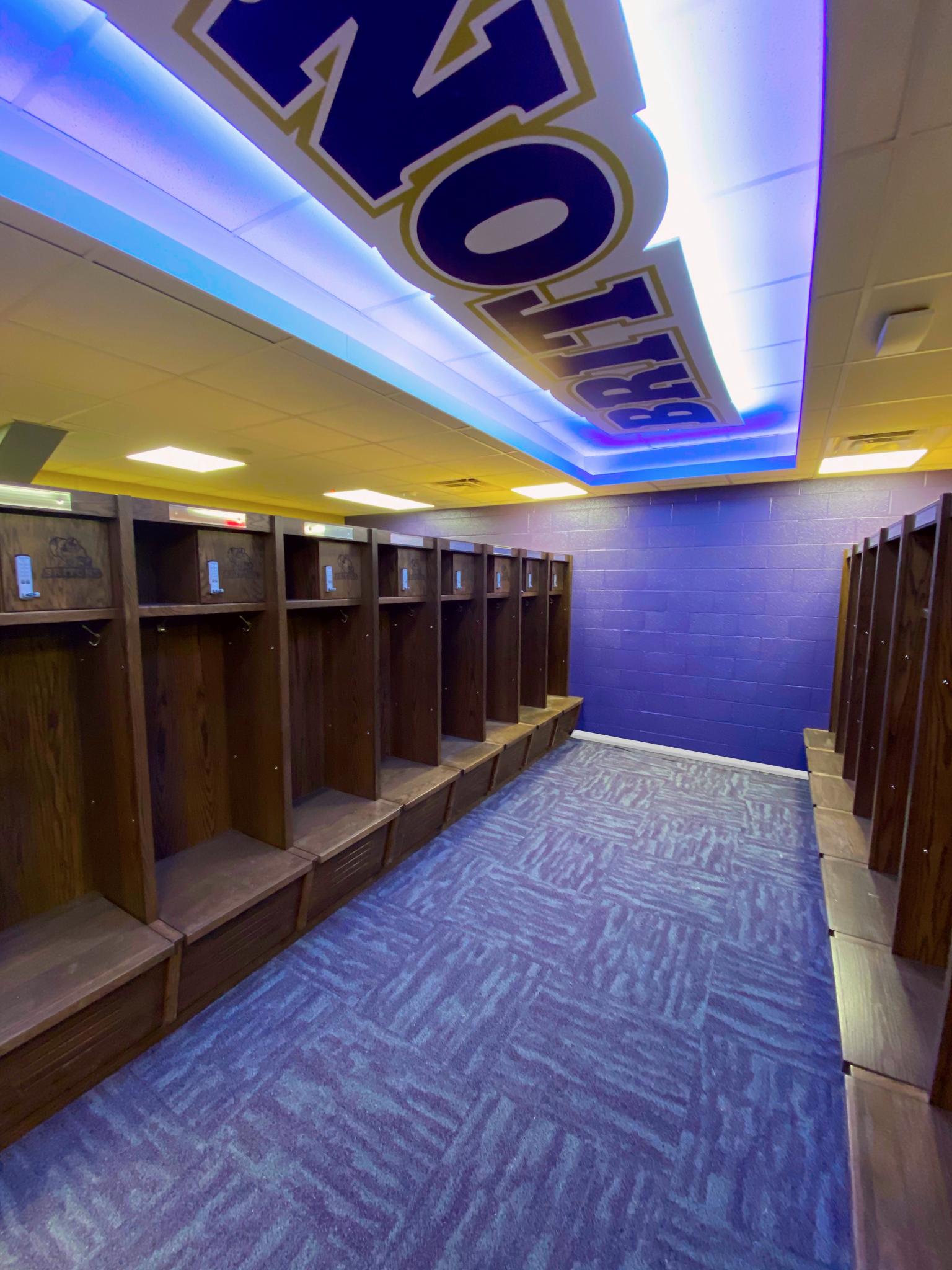 image of purple carpet and set of wooden lockers